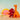 Gestrickte Babyrassel Diplodocus Dinosaurier - Orange • Best Years Ltd